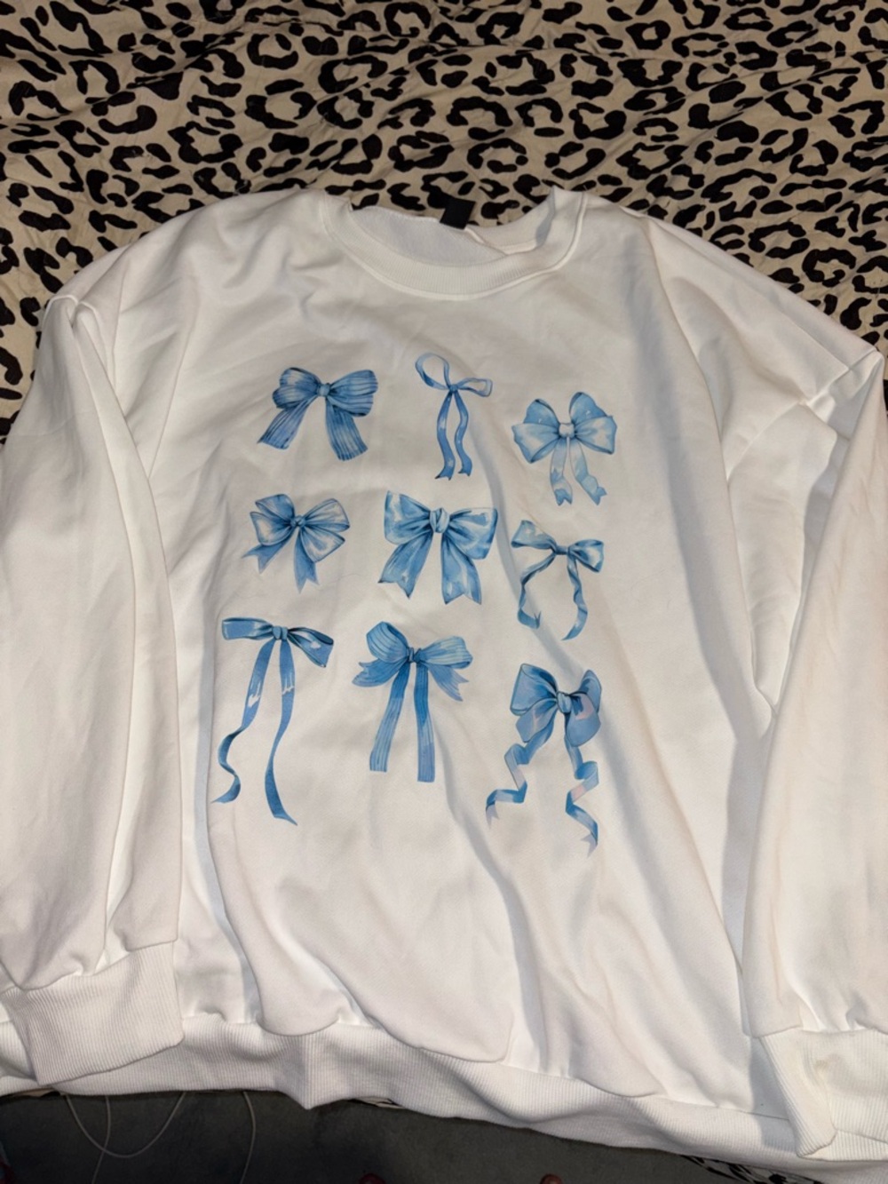 Amazon White Sweatshirt with Blue Bow Print